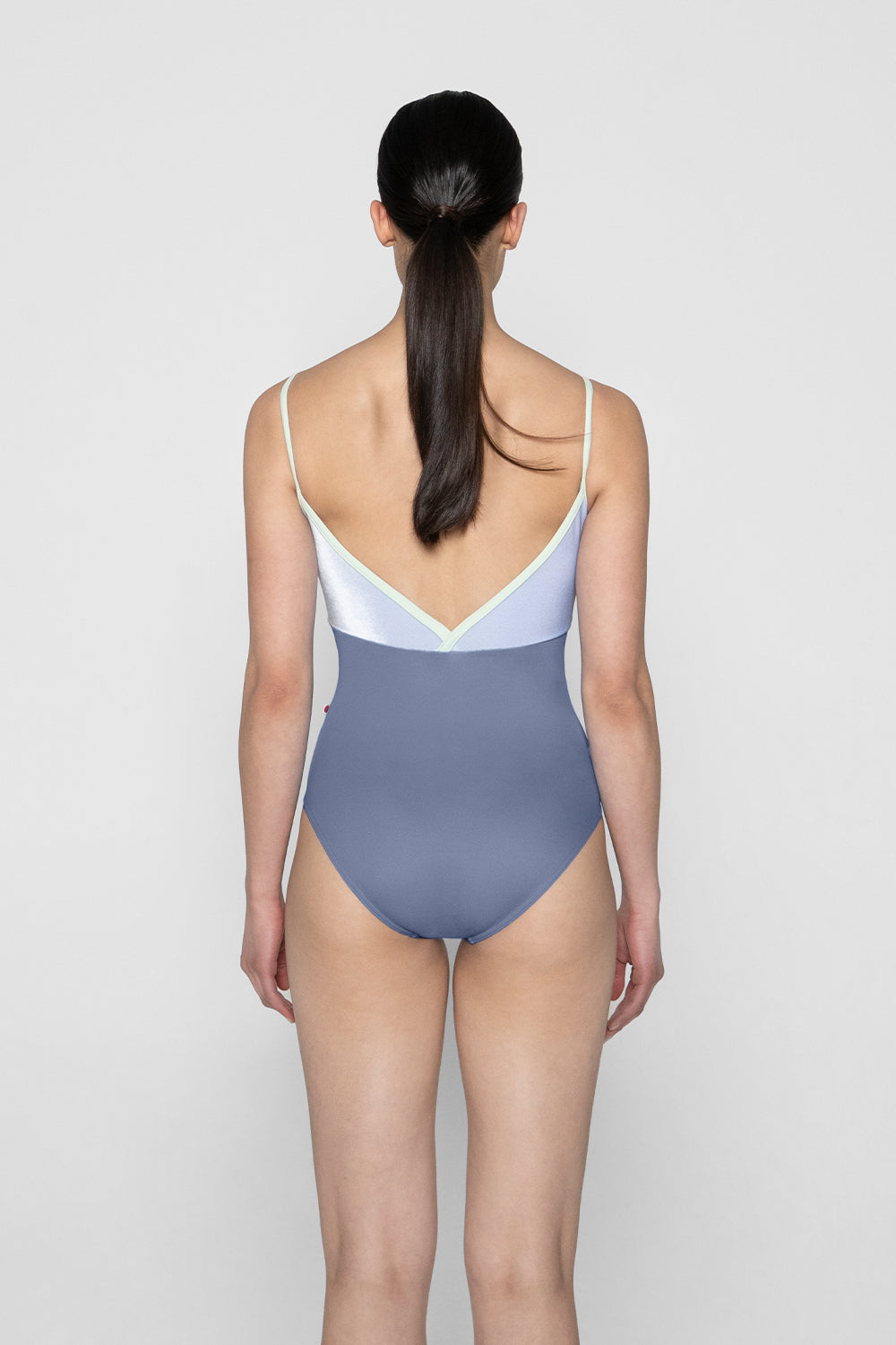 Daria leotard in T-Paradise body color with V-Serenade top color and T-Pistachio trim color