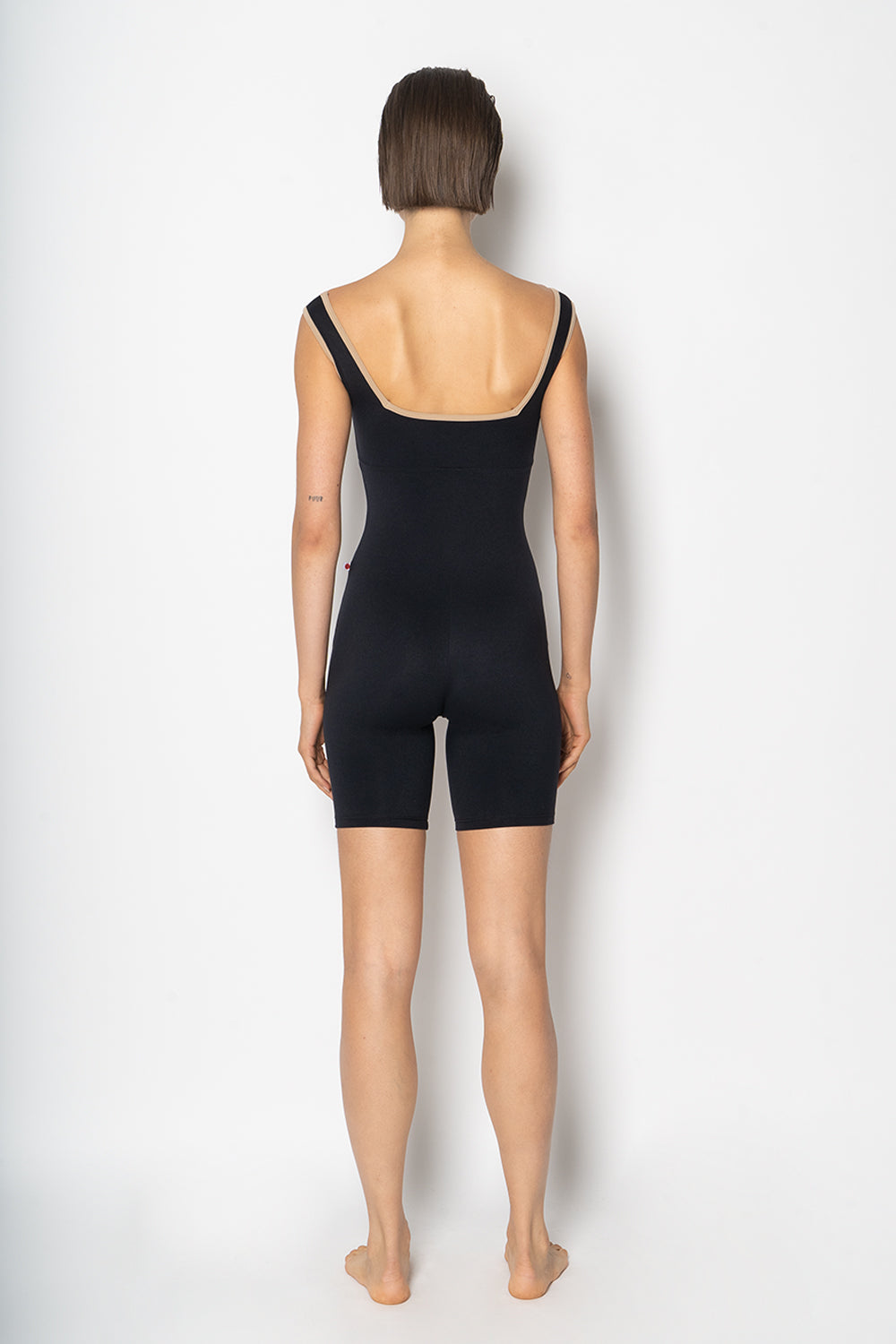 Marieke duo semi-unitard in M-Black body color with M-Almond trim color