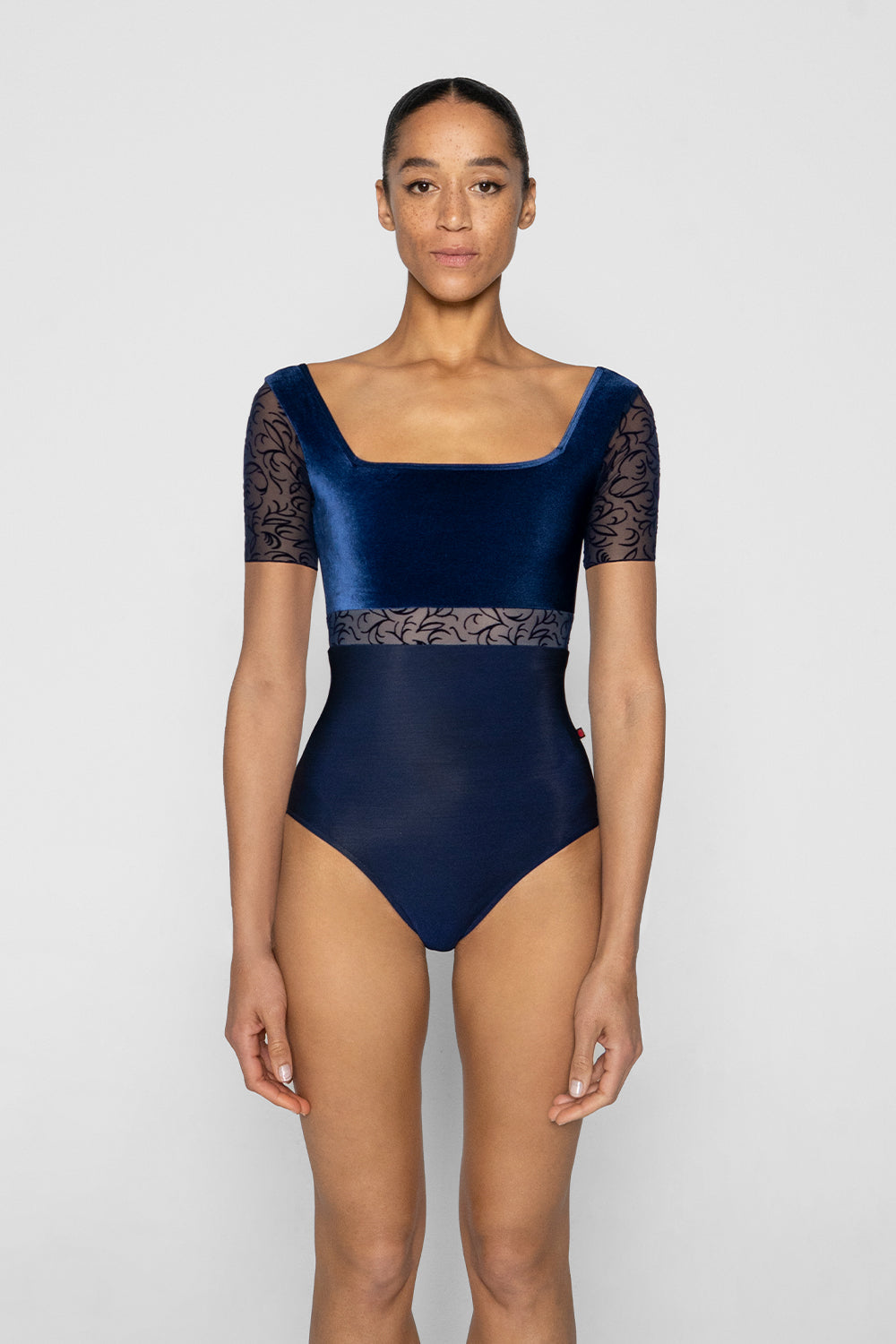 Marieke Variation 1 Black Label leotard in N-Dark Blue body color with V-Pisces top & trim color and Flocked Velvet Mesh middle band and short sleeves