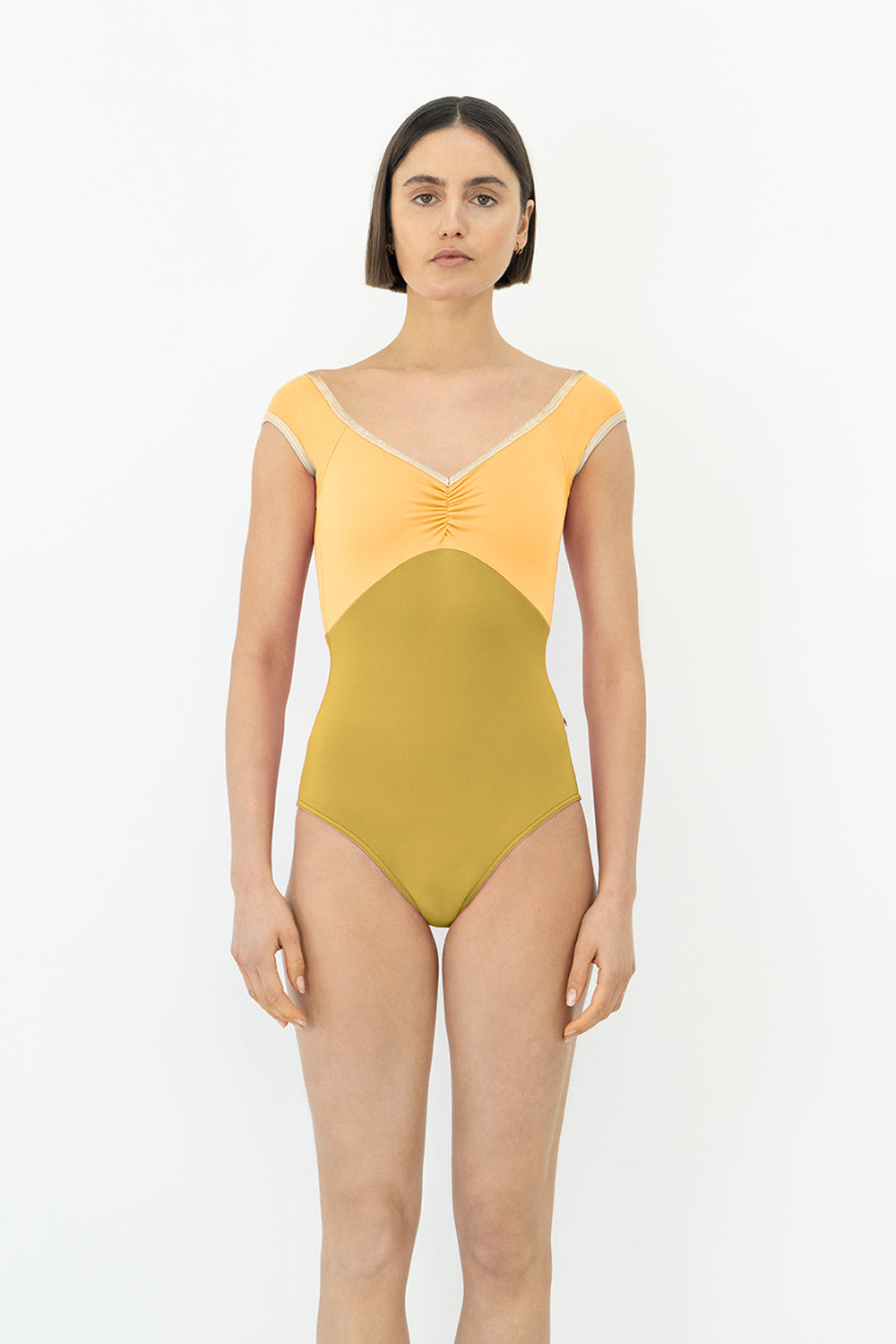 Elli leotard in N-Cricket body color with N-Daffodil top color and CV-Vanilla trim color