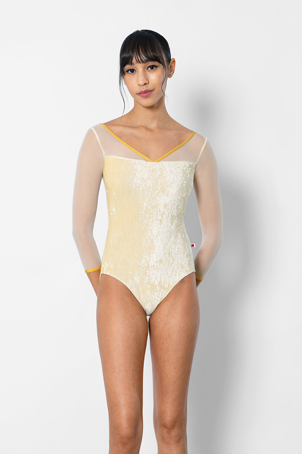 Masha leotard in CV-Vanilla body color with Mesh Vanilla top & 3Q sleeve color and N-Glow trim color