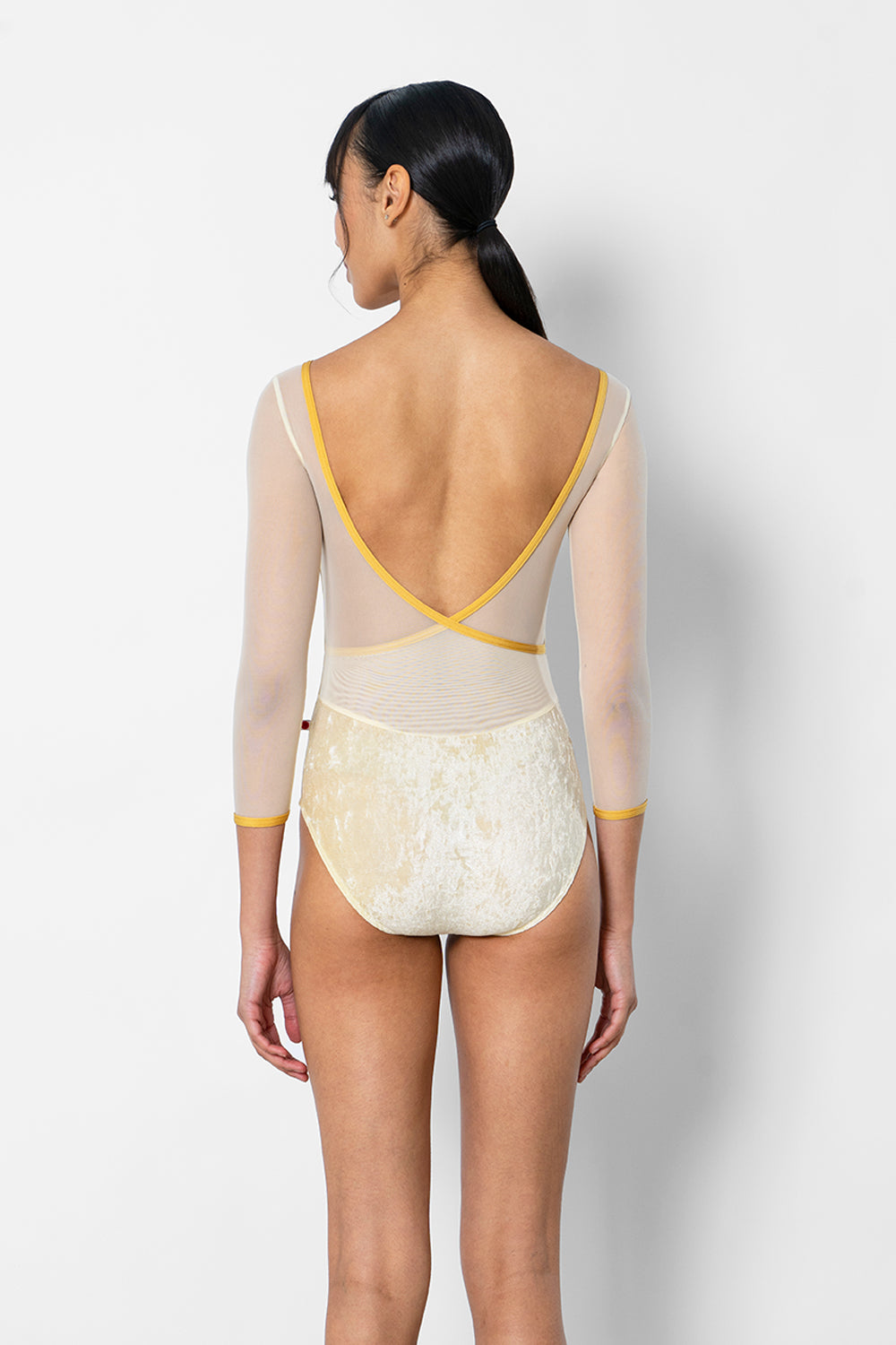 Masha leotard in CV-Vanilla body color with Mesh Vanilla top & 3Q sleeve color and N-Glow trim color