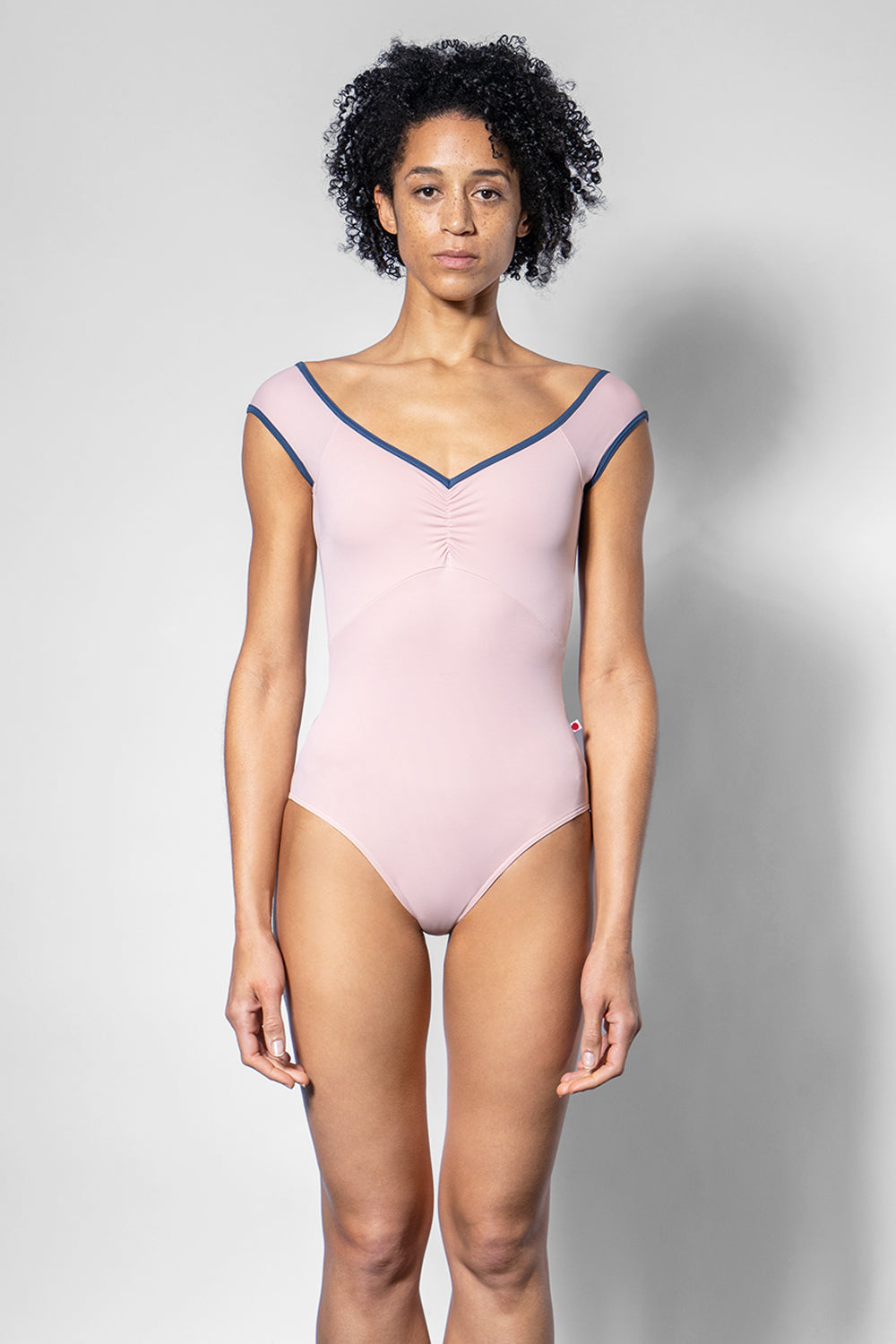 Elli leotard in T-Petal body and top color with T-Storm trim color