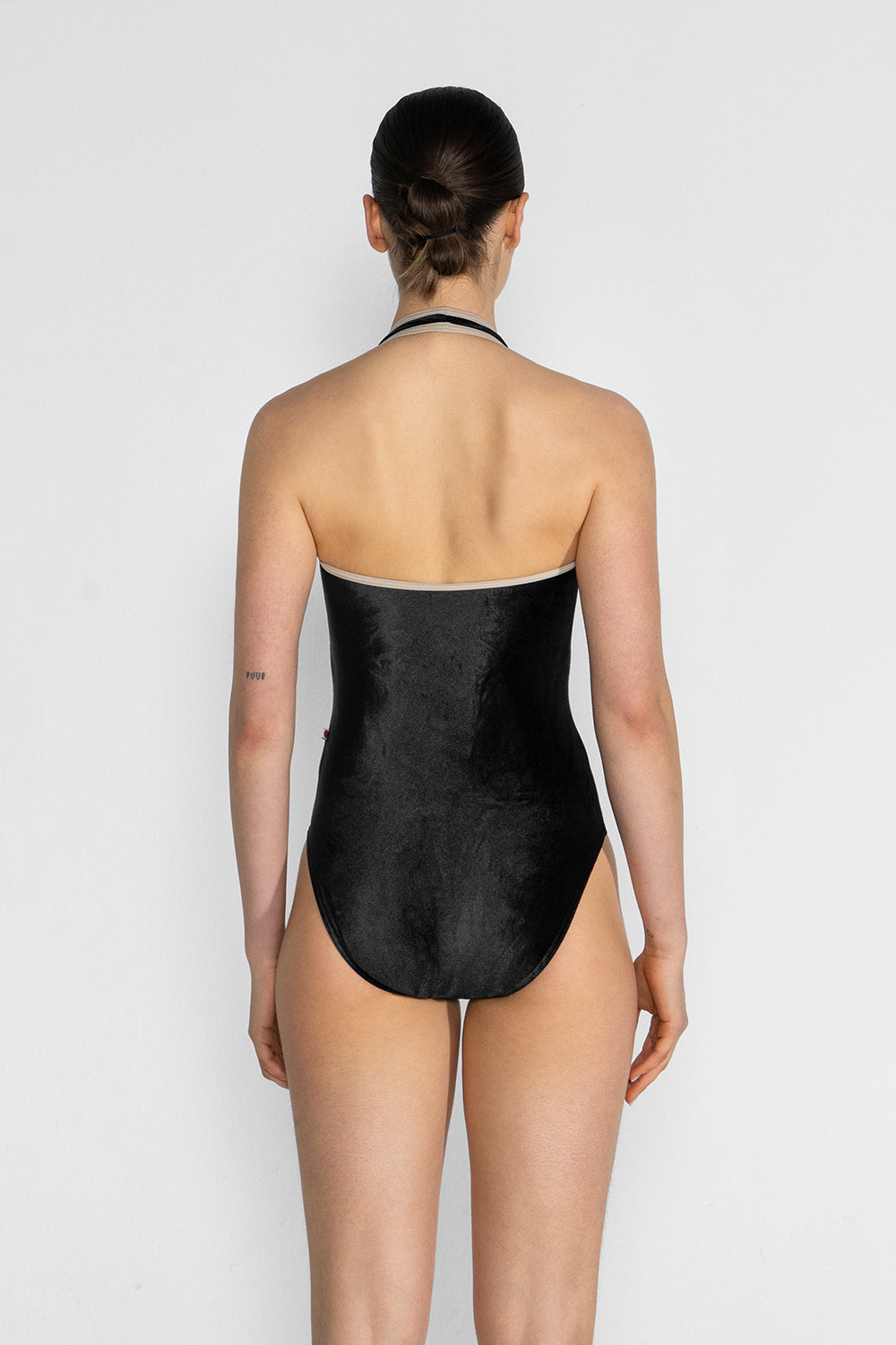 Jaione leotard in V-Black body color with T-Mosaic trim color