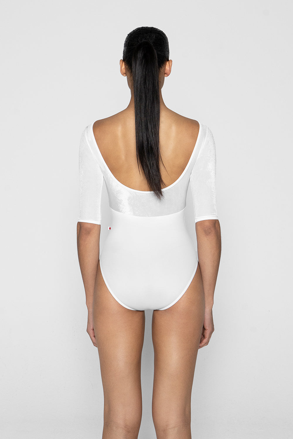 Anna Duo leotard in T-White body color with V-White top color and T-White trim color with half Sleeves