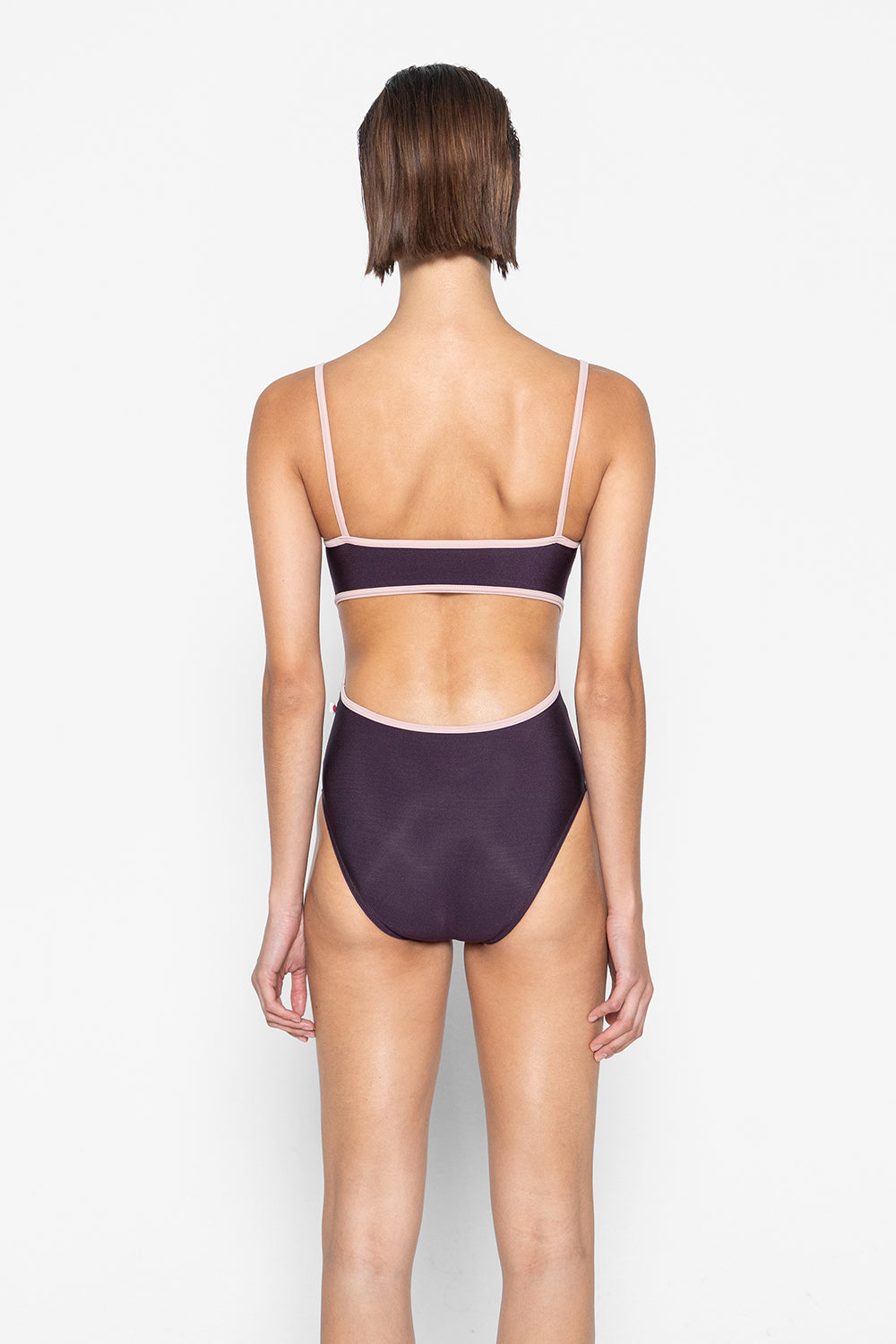 Kiki pinch leotard in N-Eggplant body color with T-Petal trim color