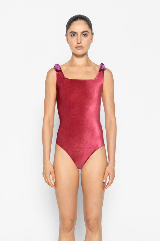 Marieke leotard in V-Cerise body & trim color with V-Roxy shoulder bows