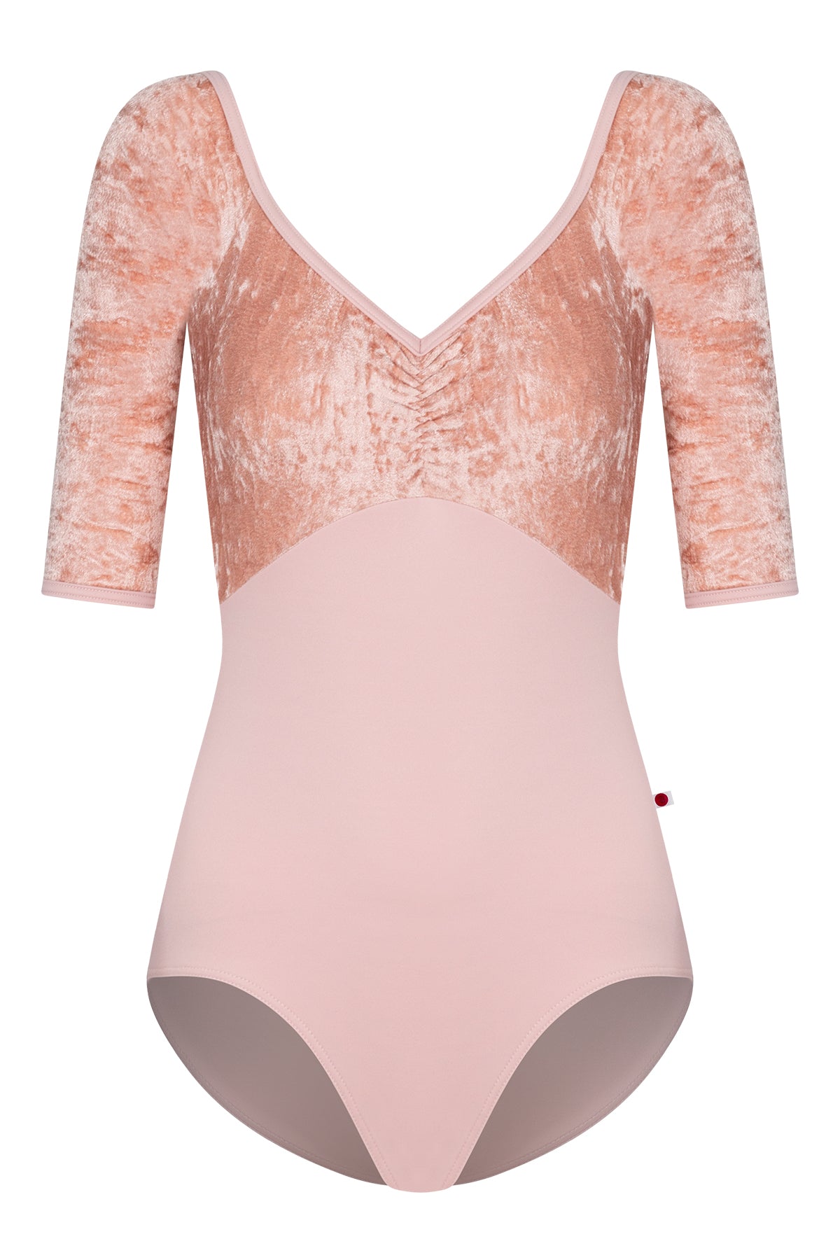 AI-generated model. Elli leotard, blush-pink with a crushed-velvet elbow-sleeve bodice and gathered V-neck.