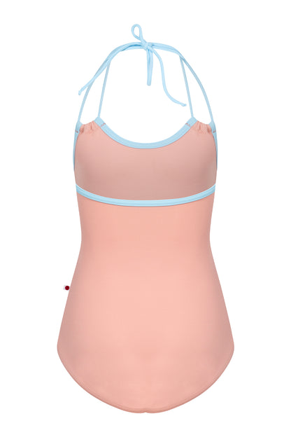 Kids Lilia leotard in blush-pink with a contrasting pale-blue neckline trim.