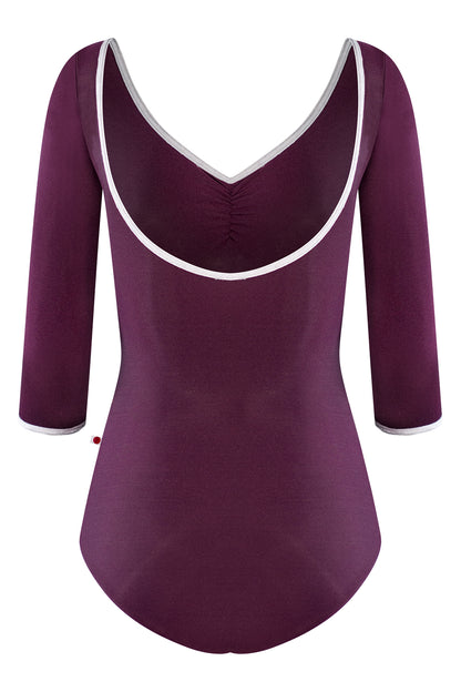 Anna leotard, aubergine-purple with a ruched V-neck, white trim and three-quarter sleeves.