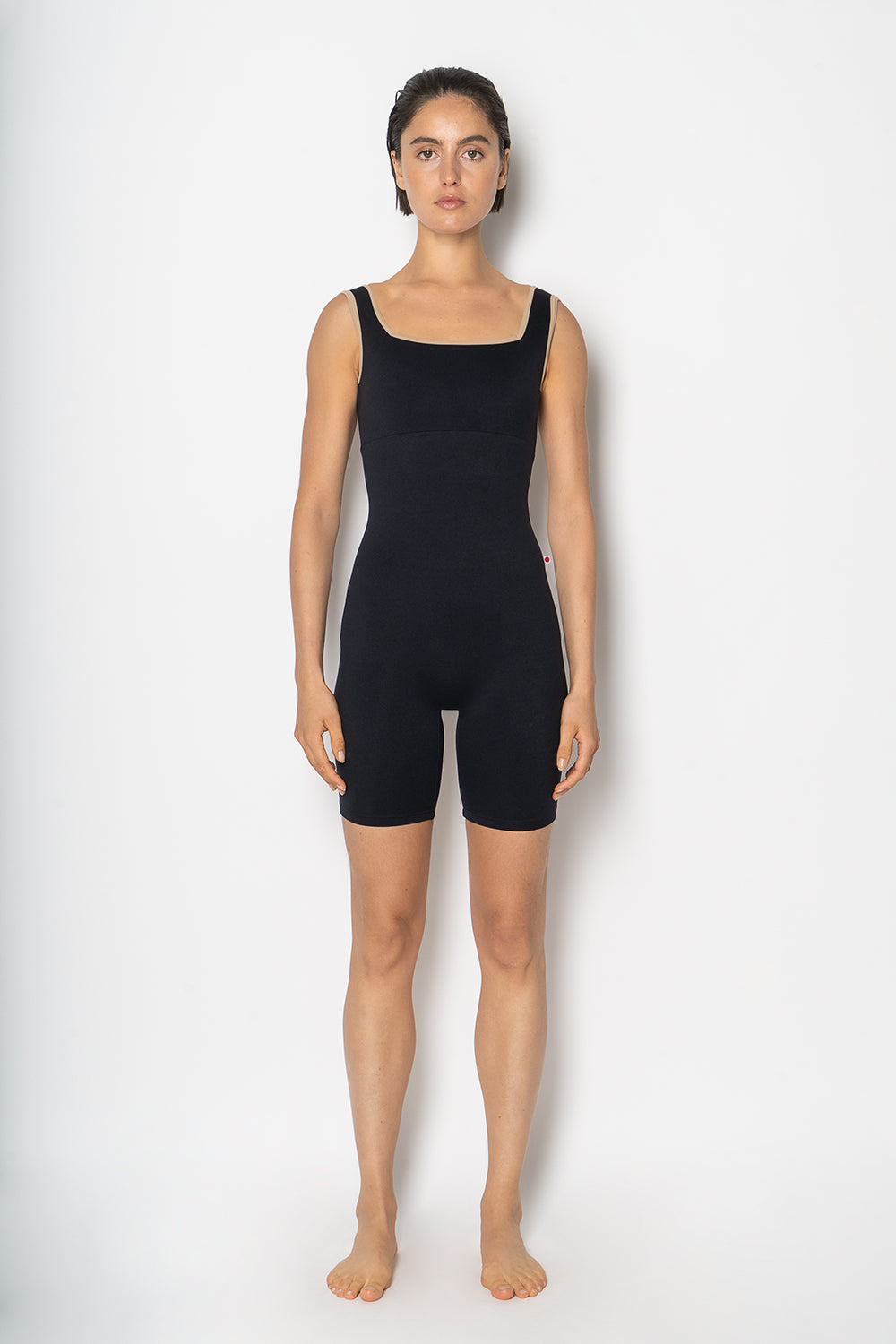 Marieke duo semi-unitard in M-Black body color with M-Almond trim color